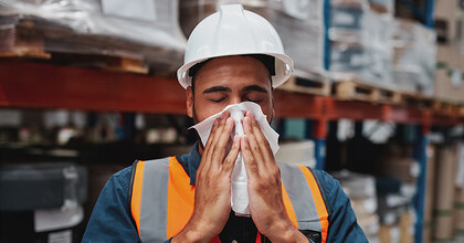 Worker sneezing