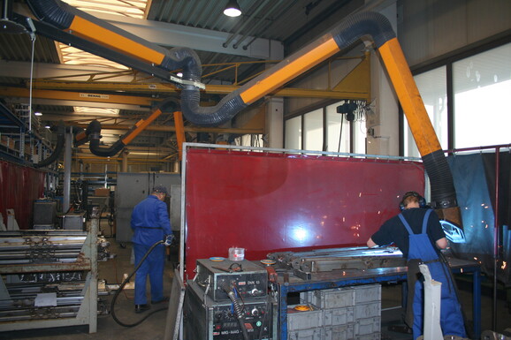 Extraction arm with NEC-crane