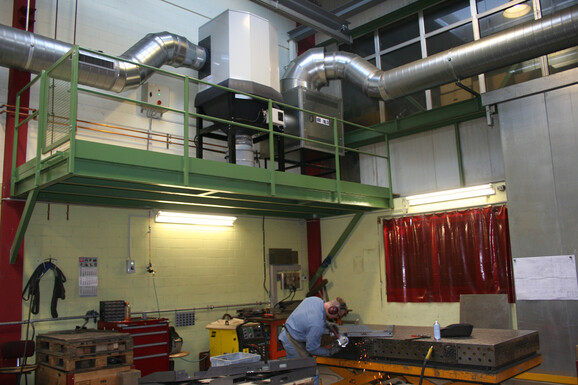 muller_martini_welder-with-scs-central-filtration-system-connecten-to-push-pull-welding-fume-extraction-system