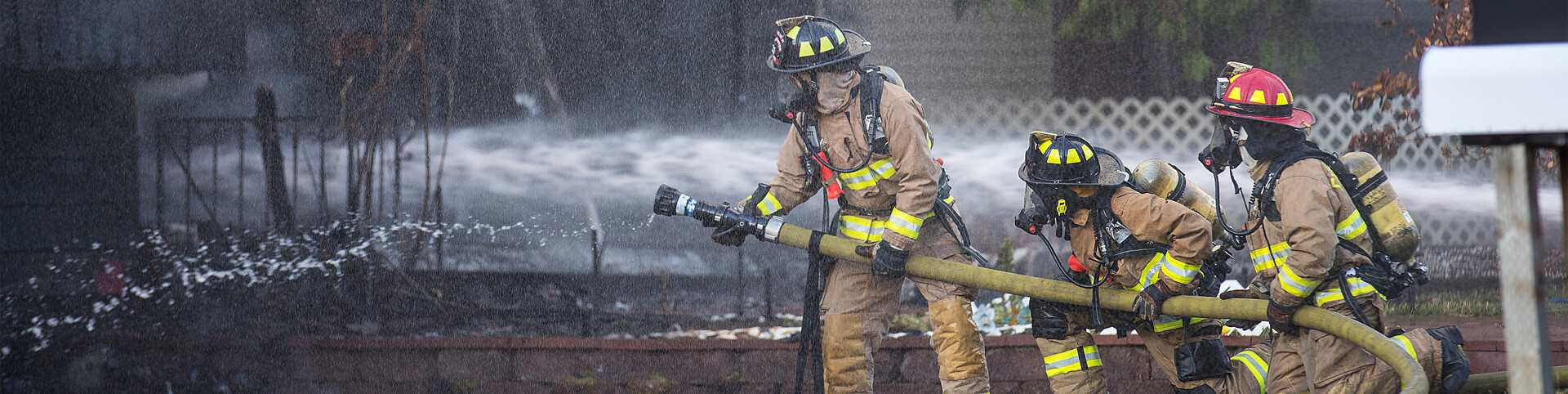 Firefighters extinguishing fire