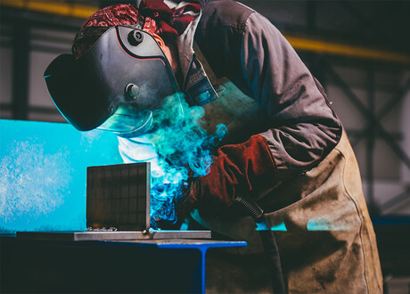 Welder in smoke