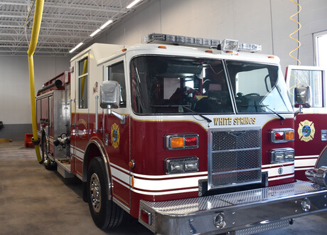 white_springs_fire_department-front-of-fire-truck-with-exhaust-extraction-hose-along-with-magnetic-grabber-and-safety-disconnect-handle