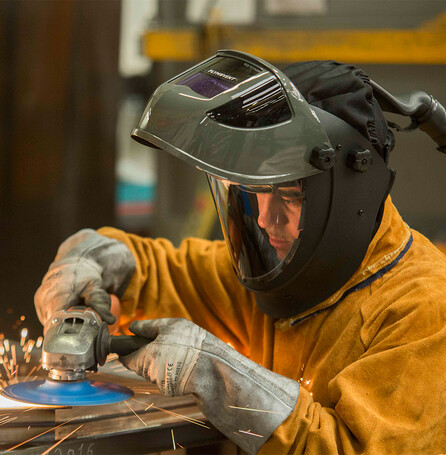 Auto darkening welding and grinding helmet