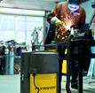 welder using PHV portable welding fume extractor